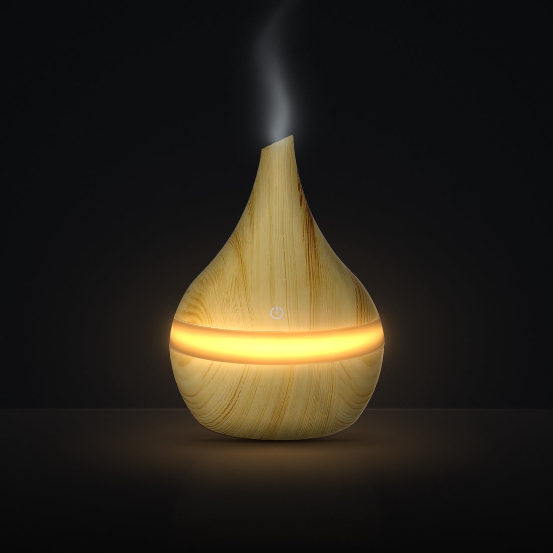LUMUNO Aroma Diffuser in Birch with cool mist rising and a warm amber glow