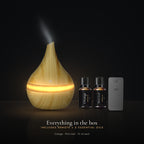 Everything in the box: LUMUNO diffuser in Birch, remote control and two 10ml essential oils, Orange and Mint Leaf