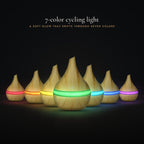 LUMUNO diffuser in Birch shown in its 7-color cycling light